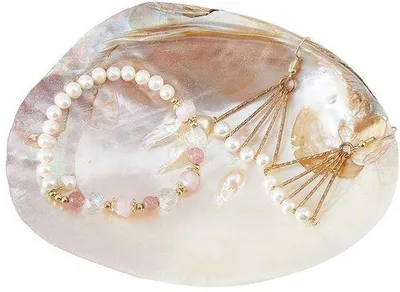 Produktbild von Allecto – Schmuckablage – Natürliche Muschel – Dekoratives Design – 14,2 x 10,8 cm – Ablage für Ringe, Ohrringe und Ketten – Geeignet für Damen