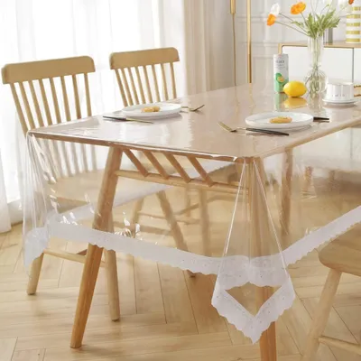 Produktbild von EMHELLE Tischdecke Transparent mit Weißer Spitze, PVC Tischschutz, Wasserdicht, Glasklar 0,1 mm (110 x 140 cm)