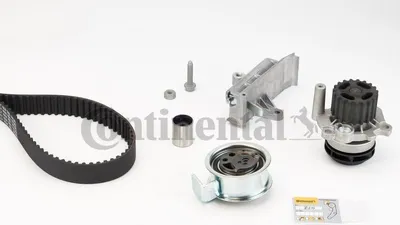 A collection of automotive engine timing belt components is displayed on a white background.