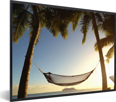 Produktbild von MuchoWow® Gerahmtes Poster Palme - Hängematte - Sonnenuntergang 80x60 cm - Poster mit Schwarzem Bilderrahmen Wandposter Rahmen Foto Bilder - Schwarzem - Mit Gestell
