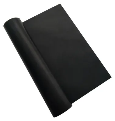 A black grill mat is rolled up on one side and spread out on the other, against a white background.