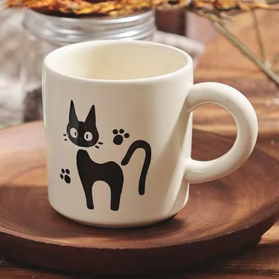 Zdjęcie produktu dla Kubek Jiji – „Kiki – dostawczyni”