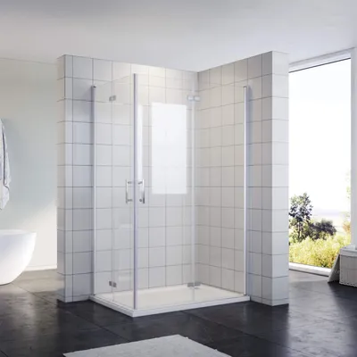 A modern bathroom with a glass shower enclosure.