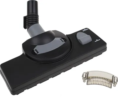 A vacuum cleaner brush head and a small attachment are shown against a white background.