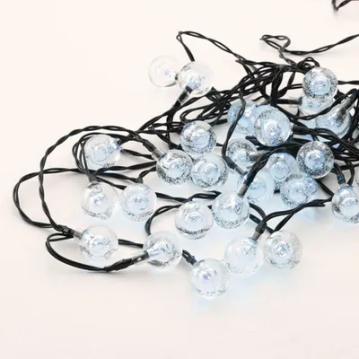 Zdjęcie produktu dla ACA Lighting 30 CW solar LED, plastikowe kule, łańcuch, zasilanie bateryjne, FLASH, czarny kabel, IP44, 4.35m+2m X043024232