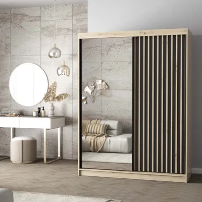 A bedroom or dressing area with a wardrobe, vanity, and decorative elements.