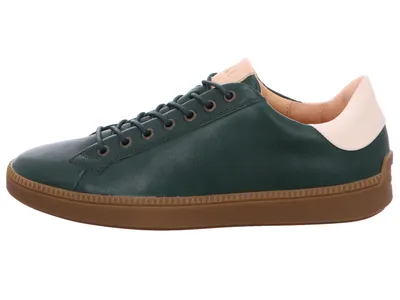 A side view of a green leather sneaker with a brown sole and beige accents.