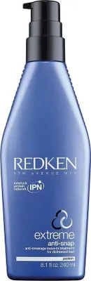 A product shot of a blue pump bottle of Redken Extreme Anti-Snap leave-in treatment.
