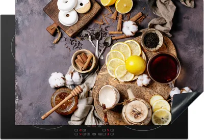 Produktbild von KitchenYeah© Herdabdeckplatte Tee - Zitrone - Honig - Donut - Kräuter , 77x51cm, Küche Deko, Glaskeramikkochfeld Herdabdeckung, Abdeckplatte fùr Kochfeld