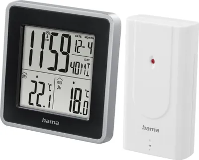 A digital weather station with a main unit and a remote sensor.