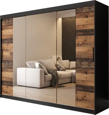 A wardrobe with mirrored doors and wooden accents, reflecting a living room scene.