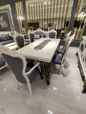 Image de nsemble de salle à manger avec table, 6 chaises et une élégance stylée