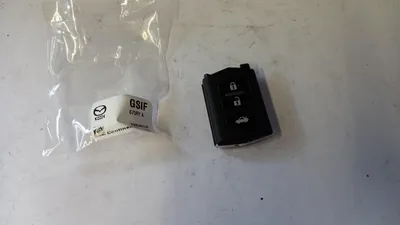 Produktbild von Original OE MAZDA Funkfernbedienung GS1F675RYA