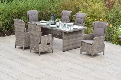 An outdoor patio setting with a dining set.