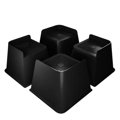 Four black furniture risers are arranged in a square formation against a white background.