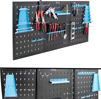 A three-panel tool wall organizer with various tools and accessories mounted on it.
