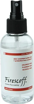 A clear studio shot of a spray bottle of Firescoff ceramic flux coating.