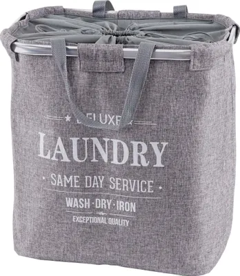 A grey laundry basket with text printed on it.