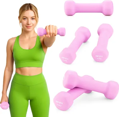 A woman in athletic wear holding a dumbbell, with multiple dumbbells displayed around her.