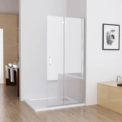A modern bathroom with a glass shower enclosure.