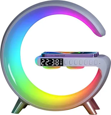 A modern desk lamp with a curved design, featuring a digital clock, a wireless charging pad for a smartphone, and multi-colored LED lighting.