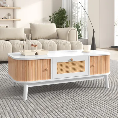 A modern living room setting with a couch and a coffee table.