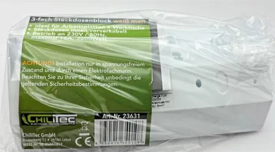 A product wrapped in clear plastic packaging, showing a label with product information and a barcode.