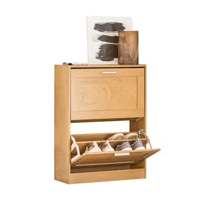 A wooden shoe cabinet with two flip-down compartments is shown against a white background. Decorative items are placed on top of the cabinet.