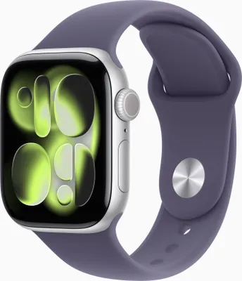 A close-up studio shot of an Apple Watch with a purple band against a white background.