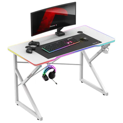 Zdjęcie produktu dla Huzaro Hero 1.7 | biurko gamingowe z oświetleniem LED | 120x60cm | haczyk na słuchawki uchwyt na kubek | powierzchnia z włókna węglowego | przelotka na kabel | biały
