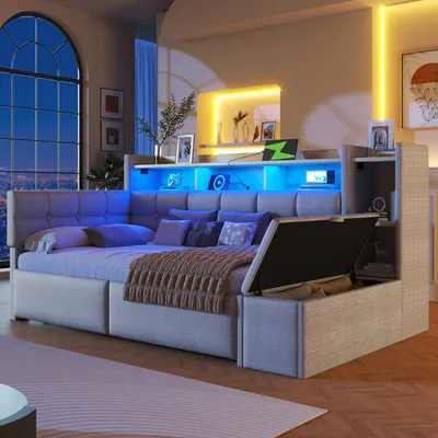 A modern bedroom or living room with a corner sofa bed, shelves, and ambient lighting.