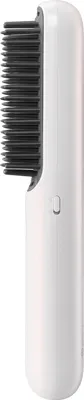 A white cordless hair straightener brush with black bristles against a white background.