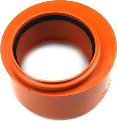 A close-up studio shot of an orange pipe fitting.