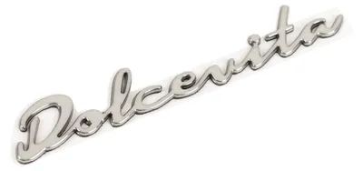 Immagine prodotto di Emblema originale, scritta "Dolcevitas" sul retro, codice prodotto: 735717826