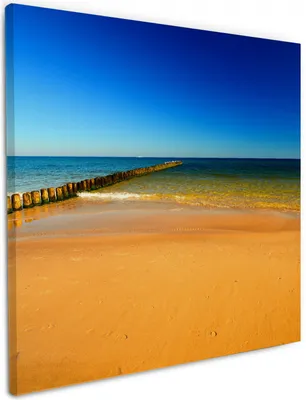 Produktbild von Wallario Premium Leinwandbild Sandstrand in orange - Blaues Meer - Blauer Himmel in Größe 50 x 50 cm