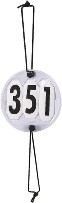 A round, transparent tag with the number 351 printed on it, hanging from a black string.