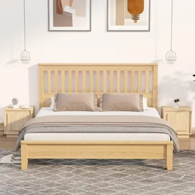 A bedroom scene with a wooden bed and two nightstands.
