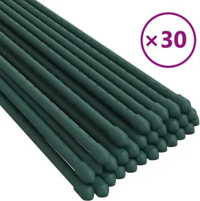 A stack of green plant stakes.