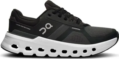 A studio shot of a single black and white running shoe.