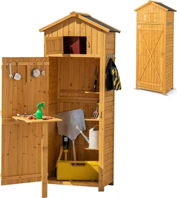 An open wooden garden shed with various gardening tools and supplies inside. A smaller, closed shed is visible in the background.