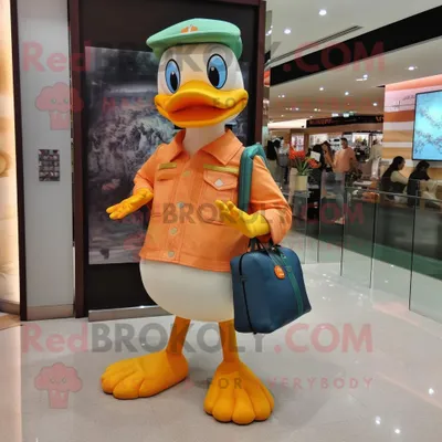Productafbeelding van Peach Duck mascotte REDBROKOLY kostuum karakter gekleed met een skinny jeans en handtassen