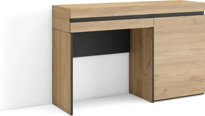 A modern wooden desk with a black accent and a drawer, shown against a white wall.