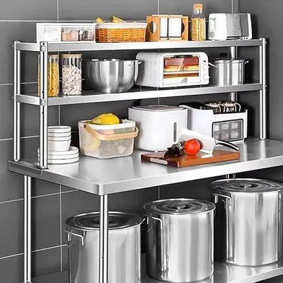 Imagen del producto de Mesa de trabajo de acero inoxidable con altura ajustable, de alta capacidad de carga, ideal para restaurantes, talleres y cocinas