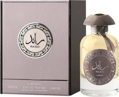 A perfume bottle and its box are displayed side-by-side against a white background.