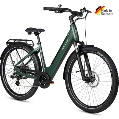 A studio shot of a green electric bicycle against a white background.