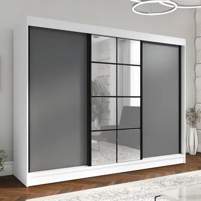 A modern wardrobe with sliding doors, featuring a mix of mirrored and opaque panels, set in a well-lit room with wooden flooring.