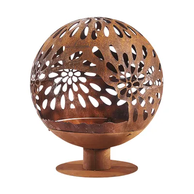 A rusted metal fire pit with a floral cut-out design, displayed on a white background.
