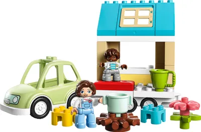 Produktbild von LEGO 10986 DUPLO Zuhause auf Rädern, Spielzeugauto mit großen Steinen, Figuren und Spielzeugauto für Jungen und Mädchen ab 2 Jahre, entwickelt Feinmotorik