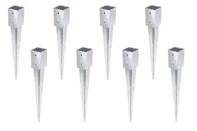 A group of metal ground spikes arranged in a grid pattern on a white background.