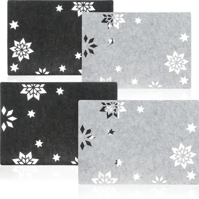 Produktbild von com-four® 4-teiliges Platzset Sterne - Filz-Platzmatten, abwischbar für Winter und Weihnachten - modernes Tischset aus Filz - Geschirrunterlage im Sternen-Design